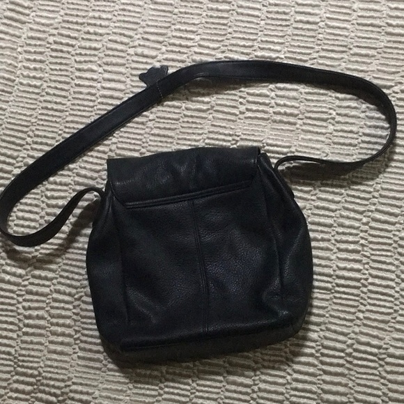 Black leather purse. Four separate pockets. Magnetic closure. 10”x11” - Picture 4 of 5
